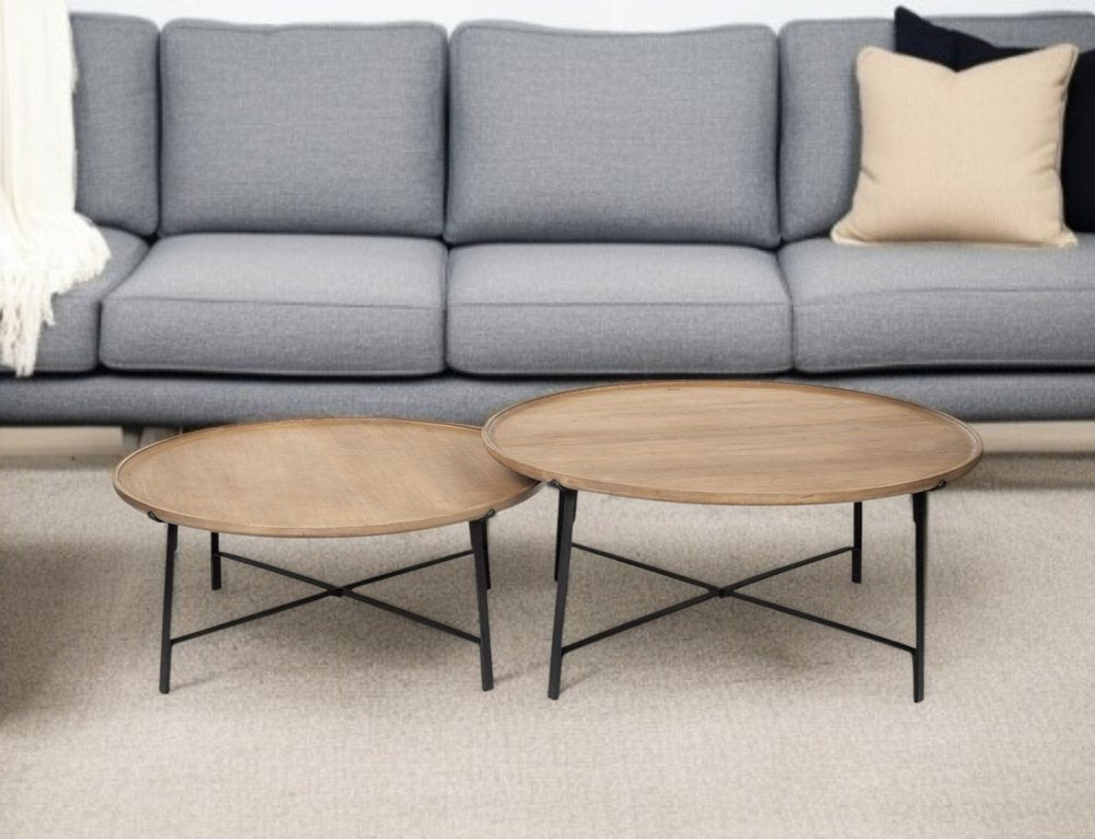 Set of Two Brown and Black Solid Wood and Iron Round Nested Coffee Tables