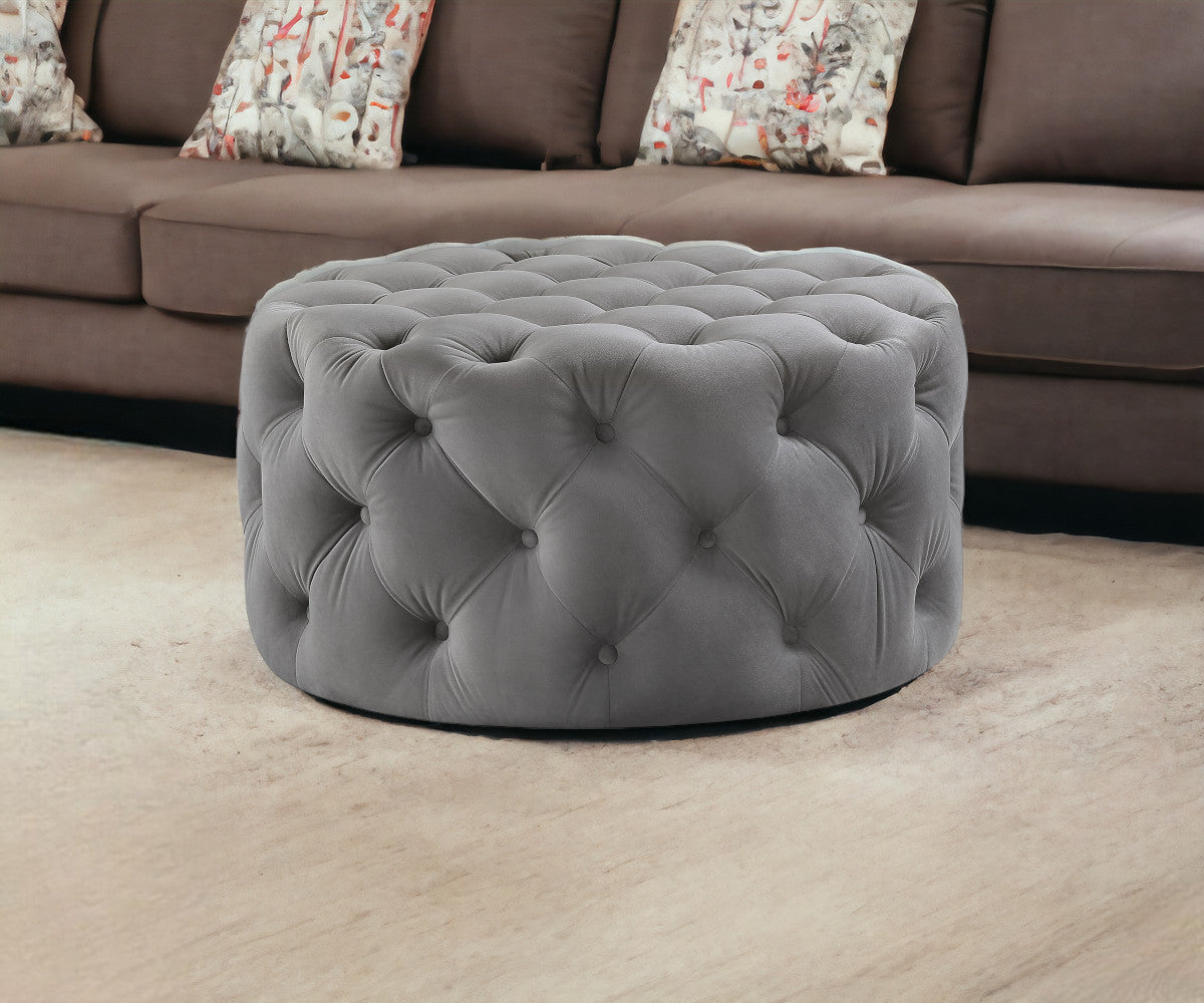 33" Blush Velvet Rolling Tufted Round Cocktail Ottoman