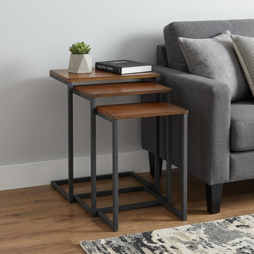 Set of Three Brown and Black Distressed Solid Wood and Metal Frame Nested Tables