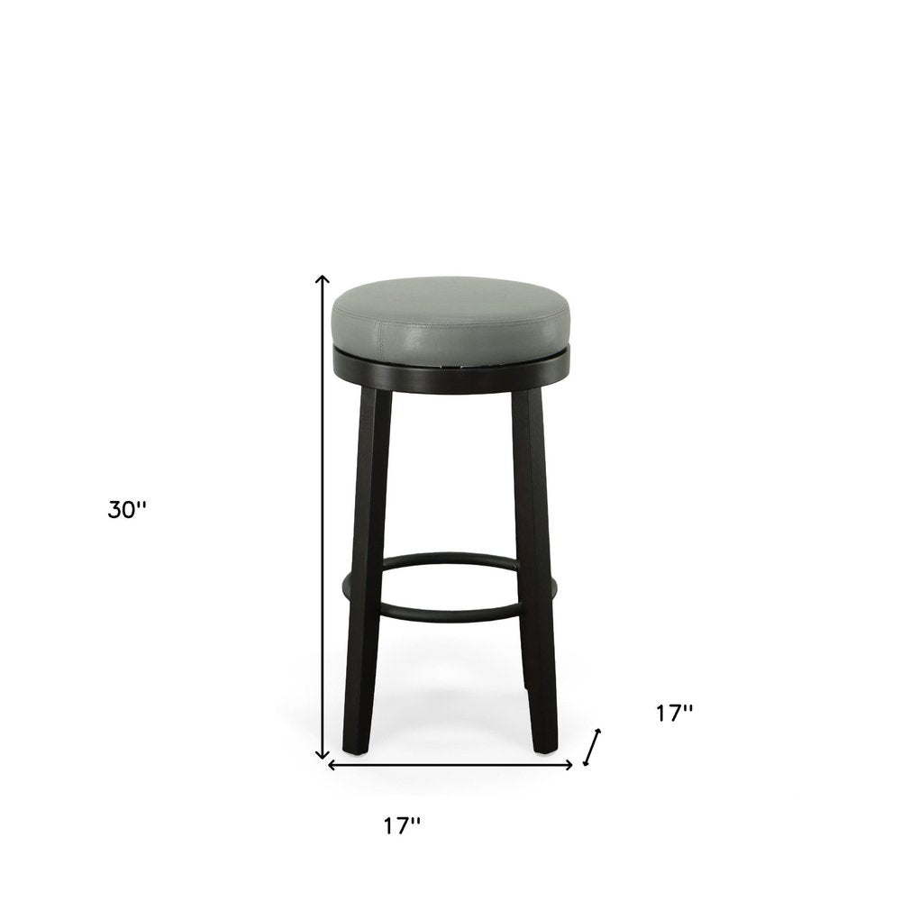 Set of Two 30" Gray and Espresso Faux Leather and Solid Wood Backless Bar Height Swivel Bar Chairs