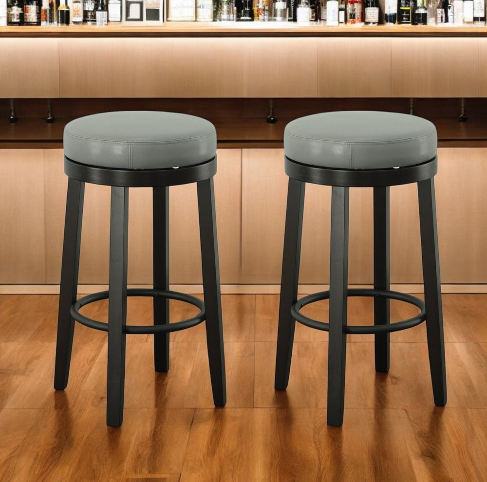 Set of Two 30" Gray and Espresso Faux Leather and Solid Wood Backless Bar Height Swivel Bar Chairs