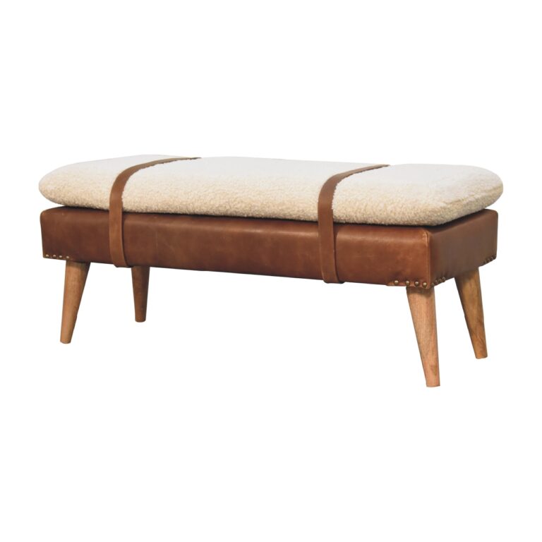 Angled left-end view of the Boucle Buffalo Hide Leather Bench, highlighting the soft bouclé cushion, rich tan buffalo hide leather, and sturdy oak wood legs.