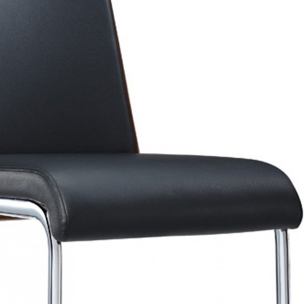 Set of Two Black and Silver Upholstered Faux Leather Dining Parsons Chairs