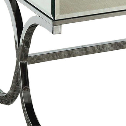 42" Clear and Silver Mirrored Glass And Iron Sled Coffee Table