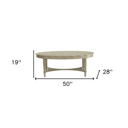 50" Antiqued White Solid Wood Oval Distressed Coffee Table