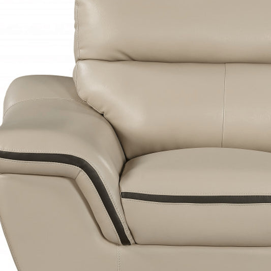 49" Beige And Silver Leather Match Convertible Chair