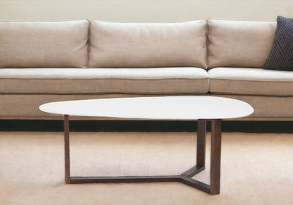 48" White and Brown Wood And Solid Wood Free Form Sled Coffee Table