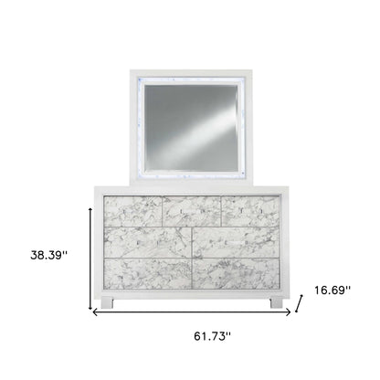 Modern White Dresser With 7 Faux Marble Detailed Front Drawer.