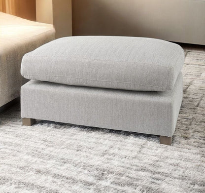 26" Light Gray Fabric and Brown Cocktail Ottoman