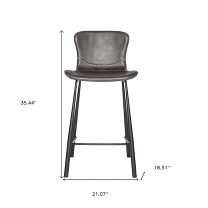 Set of Two 26" Gray And Black Faux Leather And Steel Low Back Counter Height Bar Chairs