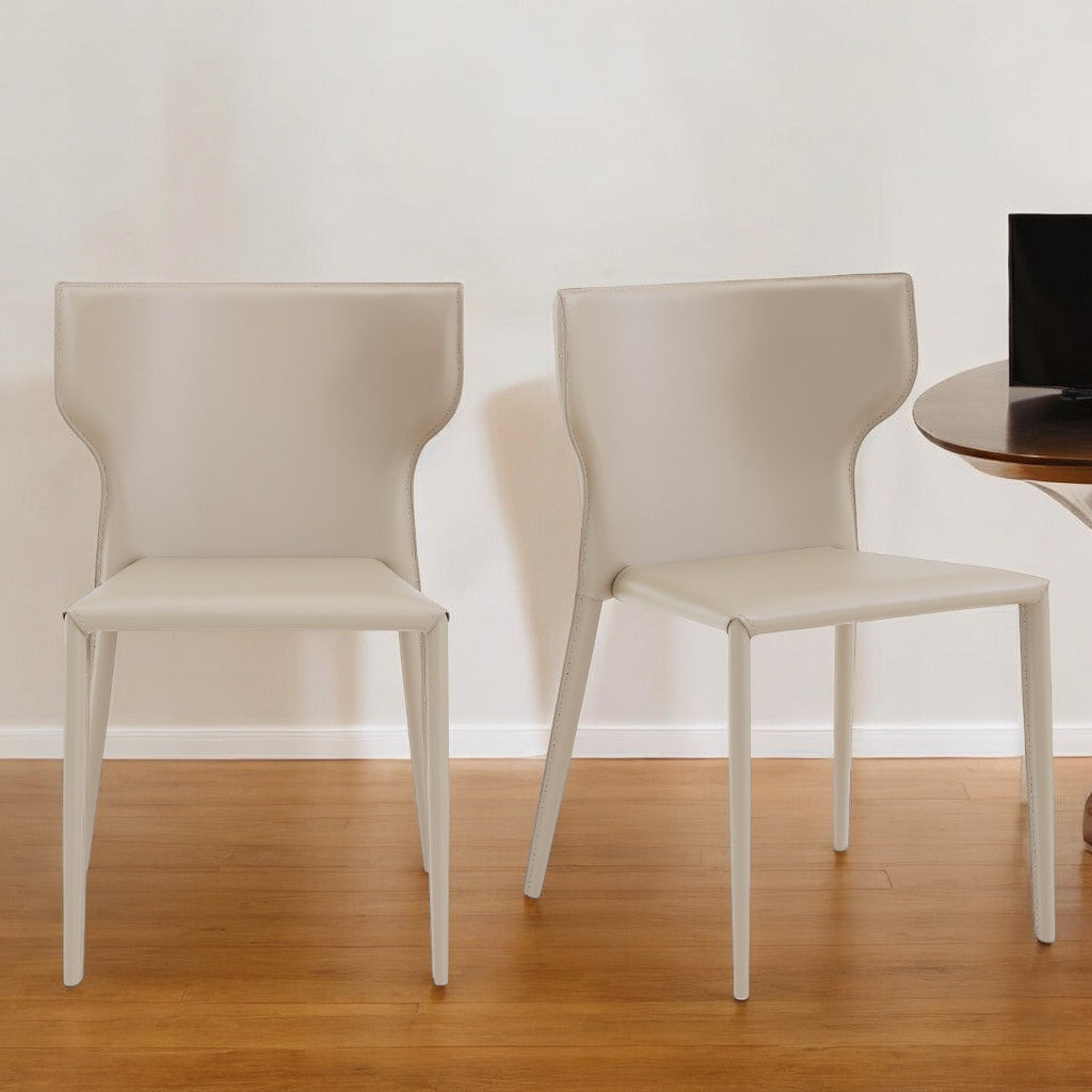 Set of Two Beige Upholstered Leather Curved Back Dining Side Chairs