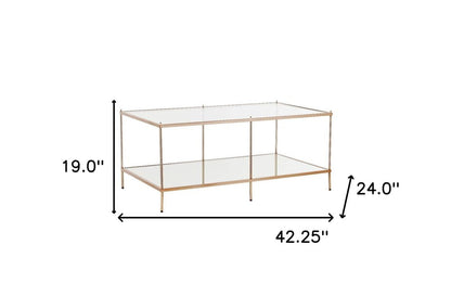 42" Clear And Gold Glass And Metal Coffee Table