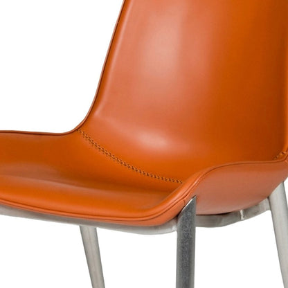 Set of Two Terra Cotta and Silver Upholstered Faux Leather Wing Back Dining Side Chairs