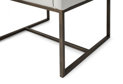Off White and Antiqued Brass Upholstered Fabric Dining Arm Chair