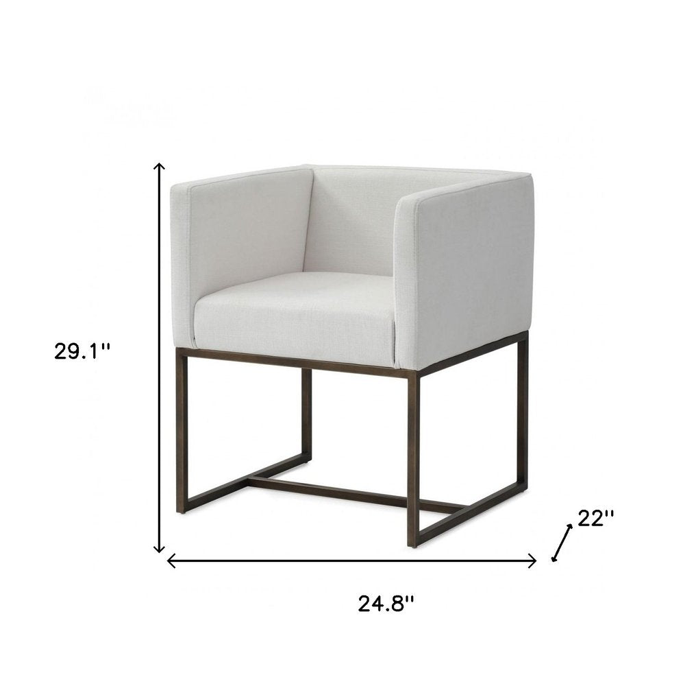 Off White and Antiqued Brass Upholstered Fabric Dining Arm Chair