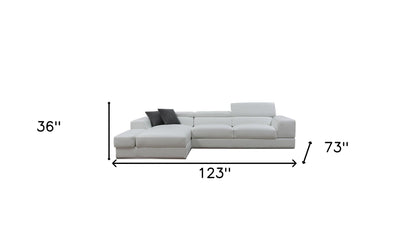 White Genuine Leather L Shaped Two Piece Sofa and Chaise Sectional With Console