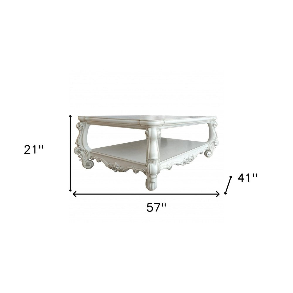 57" Antiqued White Wood Coffee Table With Shelf