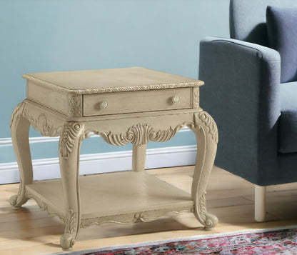 26" Antique White Manufactured Wood And Polyresin Rectangular End Table With Drawer And Shelf