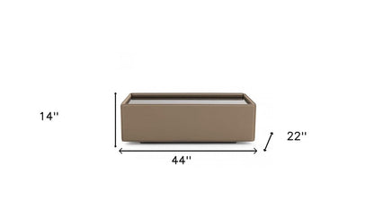 44" Black and Beige Glass And Wood Block Coffee Table