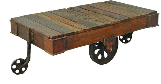 50" Brown and Black Solid Wood and Iron Distressed Wheel Coffee Table