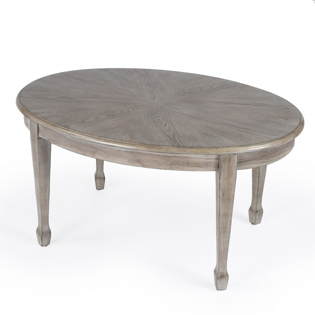 38" Natural Solid And Manufactured Wood Oval Distressed Coffee Table