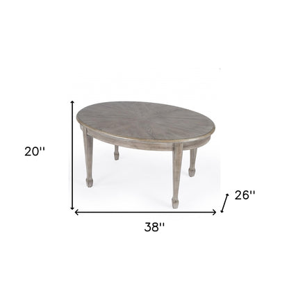 38" Natural Solid And Manufactured Wood Oval Distressed Coffee Table