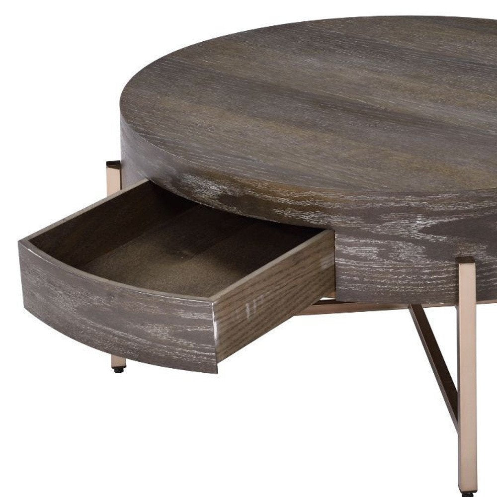 32" Dark Brown and Champagne Wood And Metal Round Sled Coffee Table With Drawer