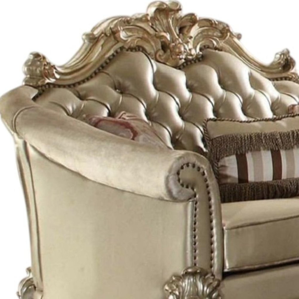 67" Bone And Gold Faux Leather Loveseat and Toss Pillows