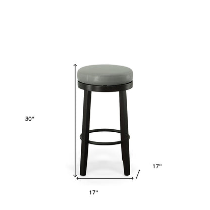 Set of Two 30" Gray and Espresso Faux Leather and Solid Wood Backless Bar Height Swivel Bar Chairs