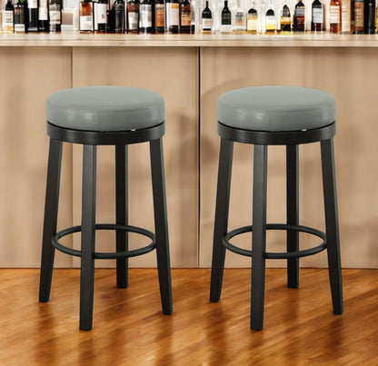 Set of Two 30" Gray and Espresso Faux Leather and Solid Wood Backless Bar Height Swivel Bar Chairs