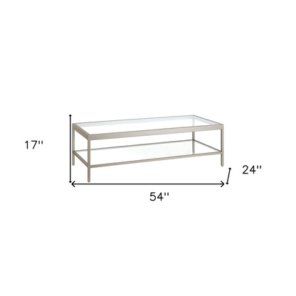 54" Clear And Silver Glass And Steel Coffee Table With Shelf