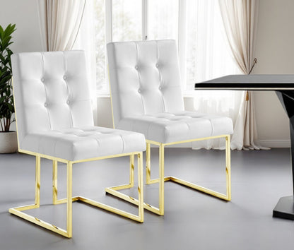 Set of Two Tufted White and Gold Upholstered Faux Leather Dining Side Chairs