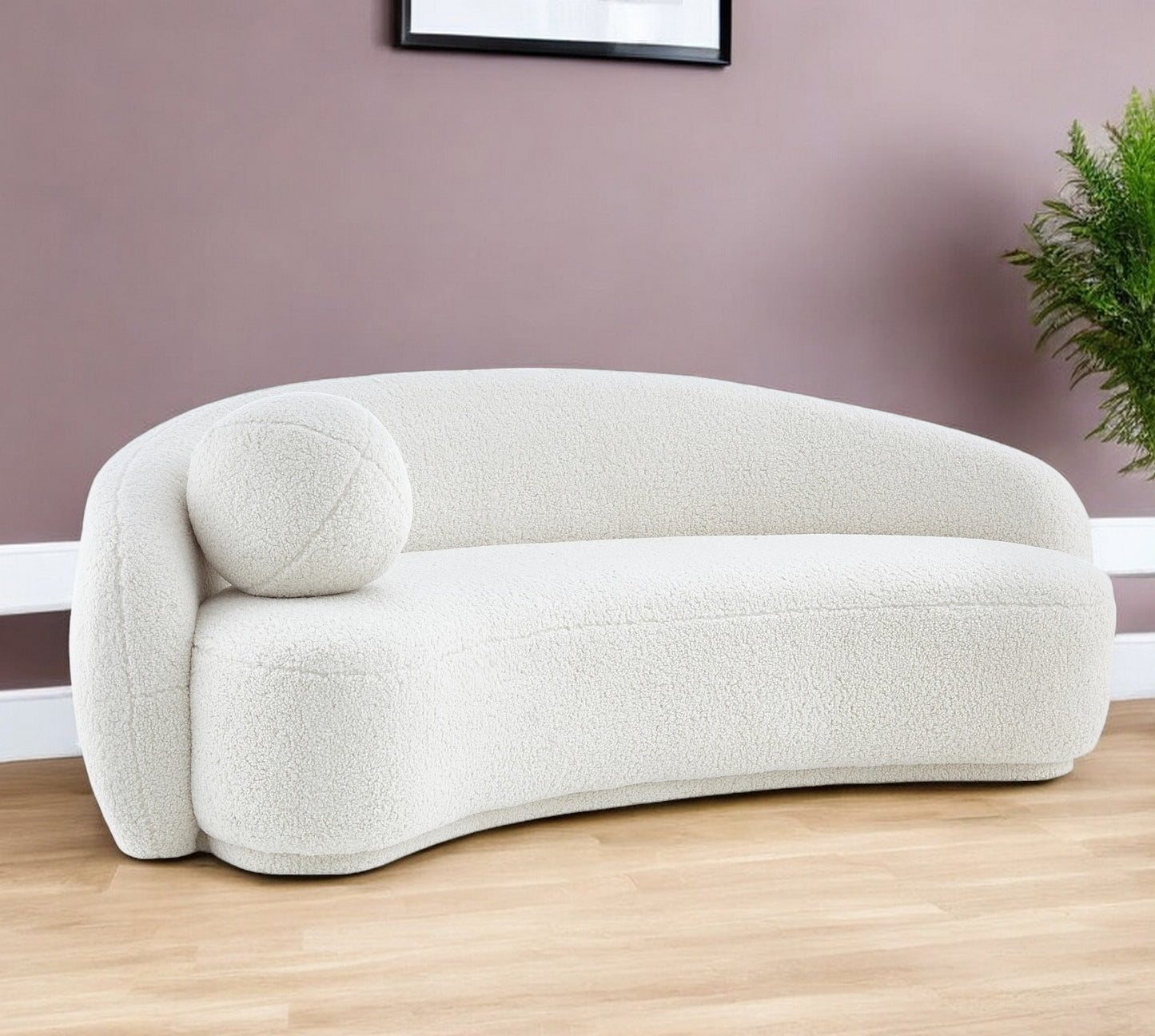 85" Cream Sherpa Curved Sofa And Toss Pillow With Legs