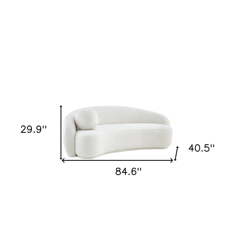 85" Cream Sherpa Curved Sofa And Toss Pillow With Legs